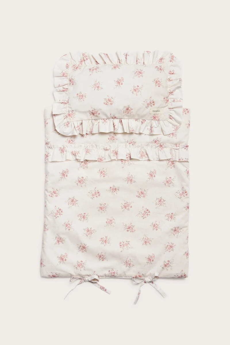 Floral bedding set for a doll bed