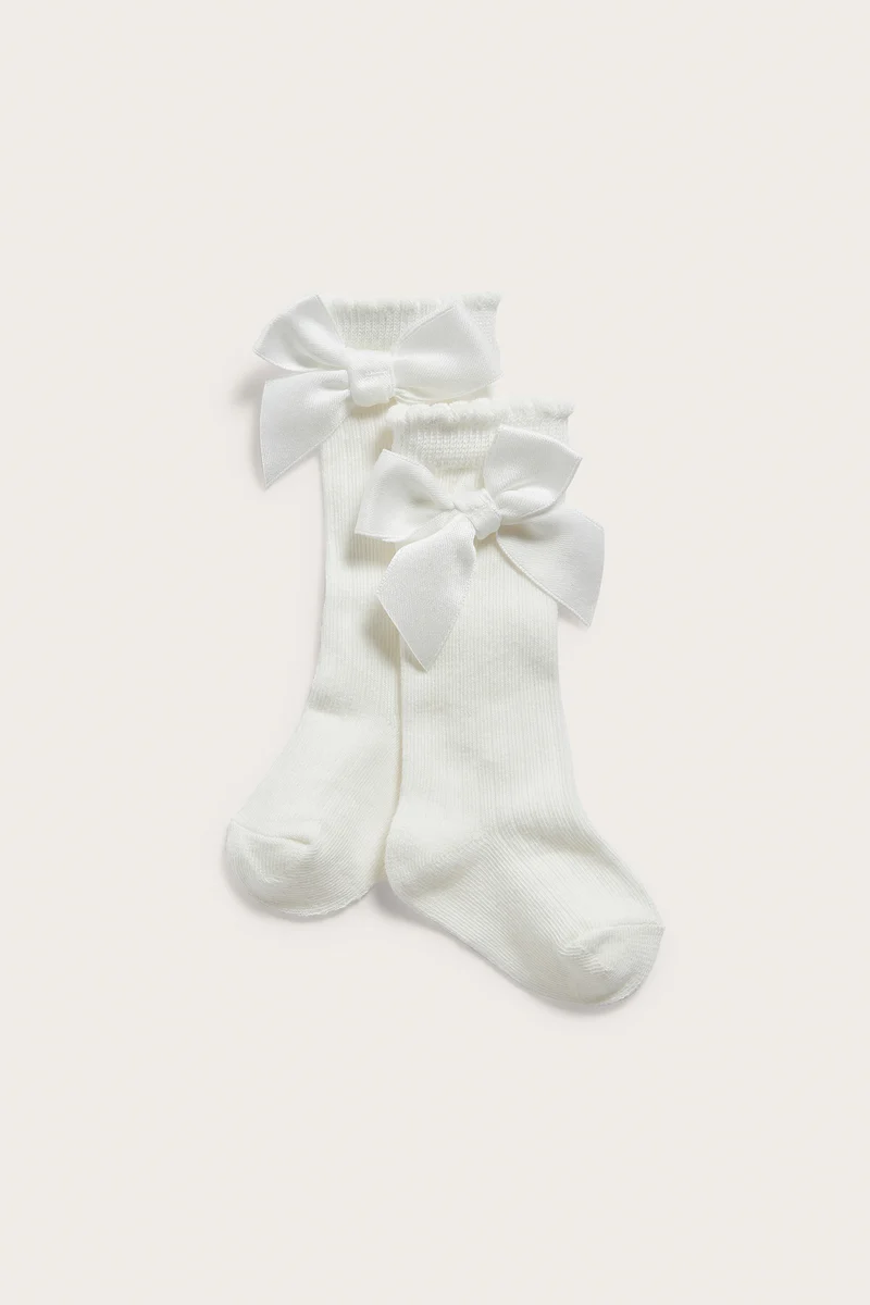 Baby white knee-high bow socks