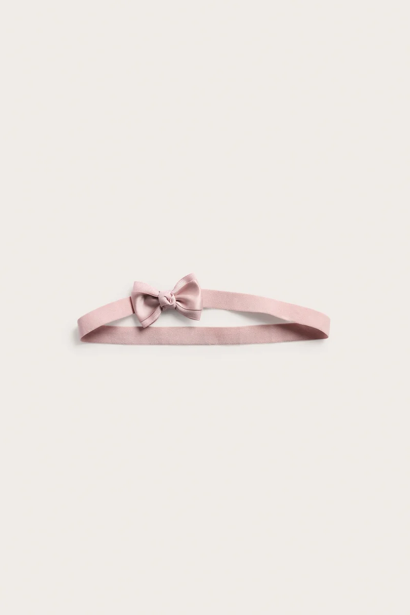 Kids pink hairband with satin bow