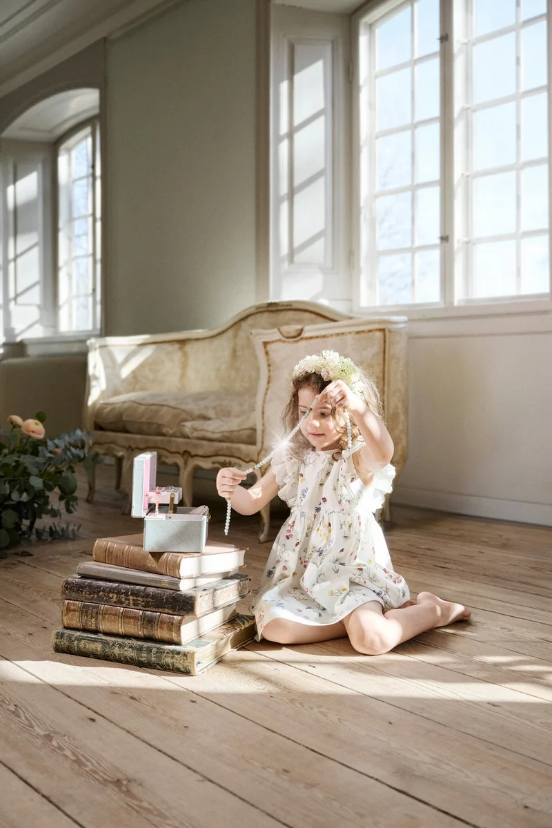 Baby white jersey dress with frill