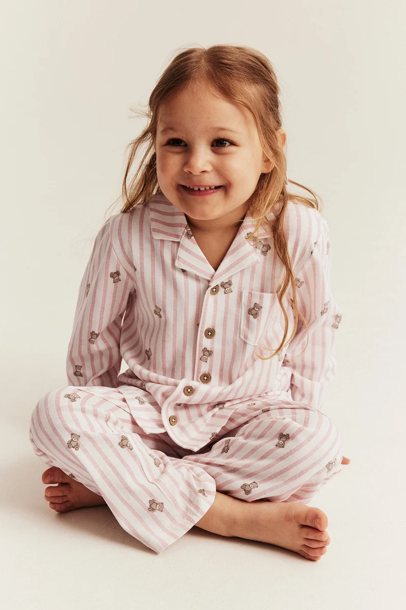 Kids striped pajamas with teddy bear motif