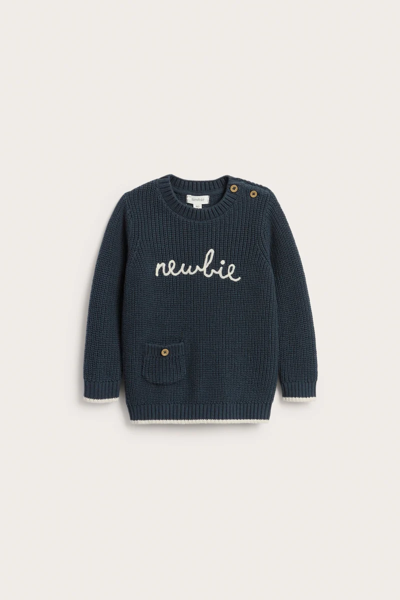 Baby blue knitted jumper with Newbie logo