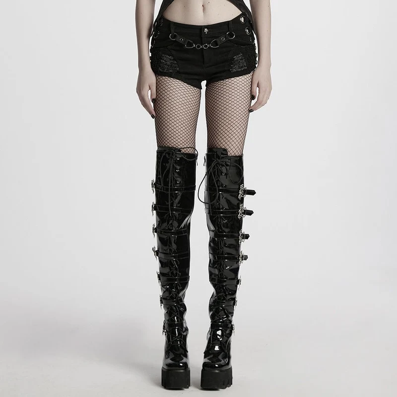 Kvinnors punkbandshorts med dubbar