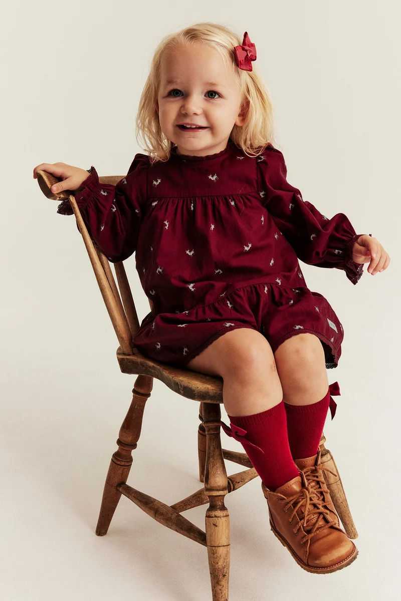 Baby red long-sleeved dress with reindeers