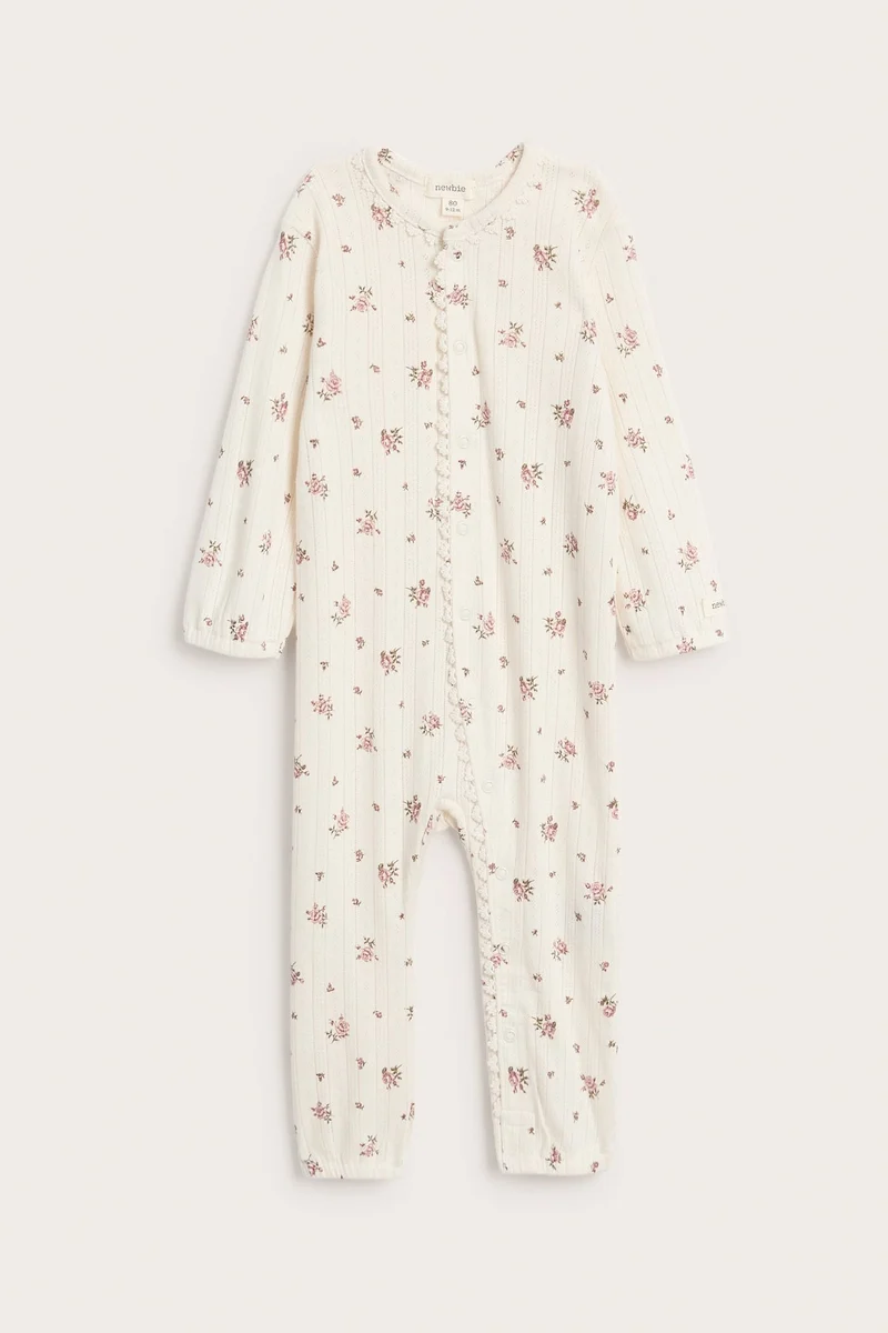Baby pyjamas with rose pattern