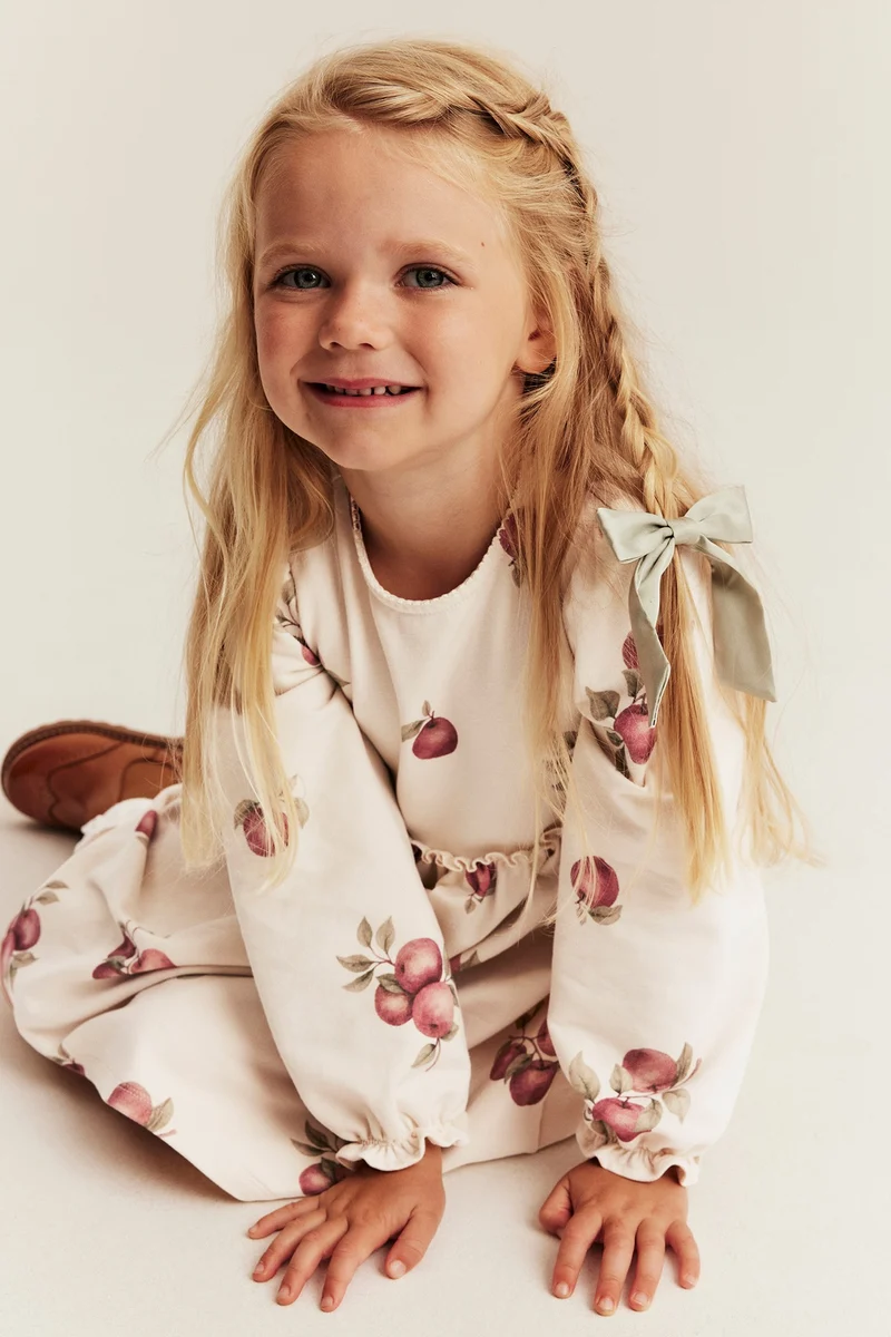 Kids beige jersey dress with apple print