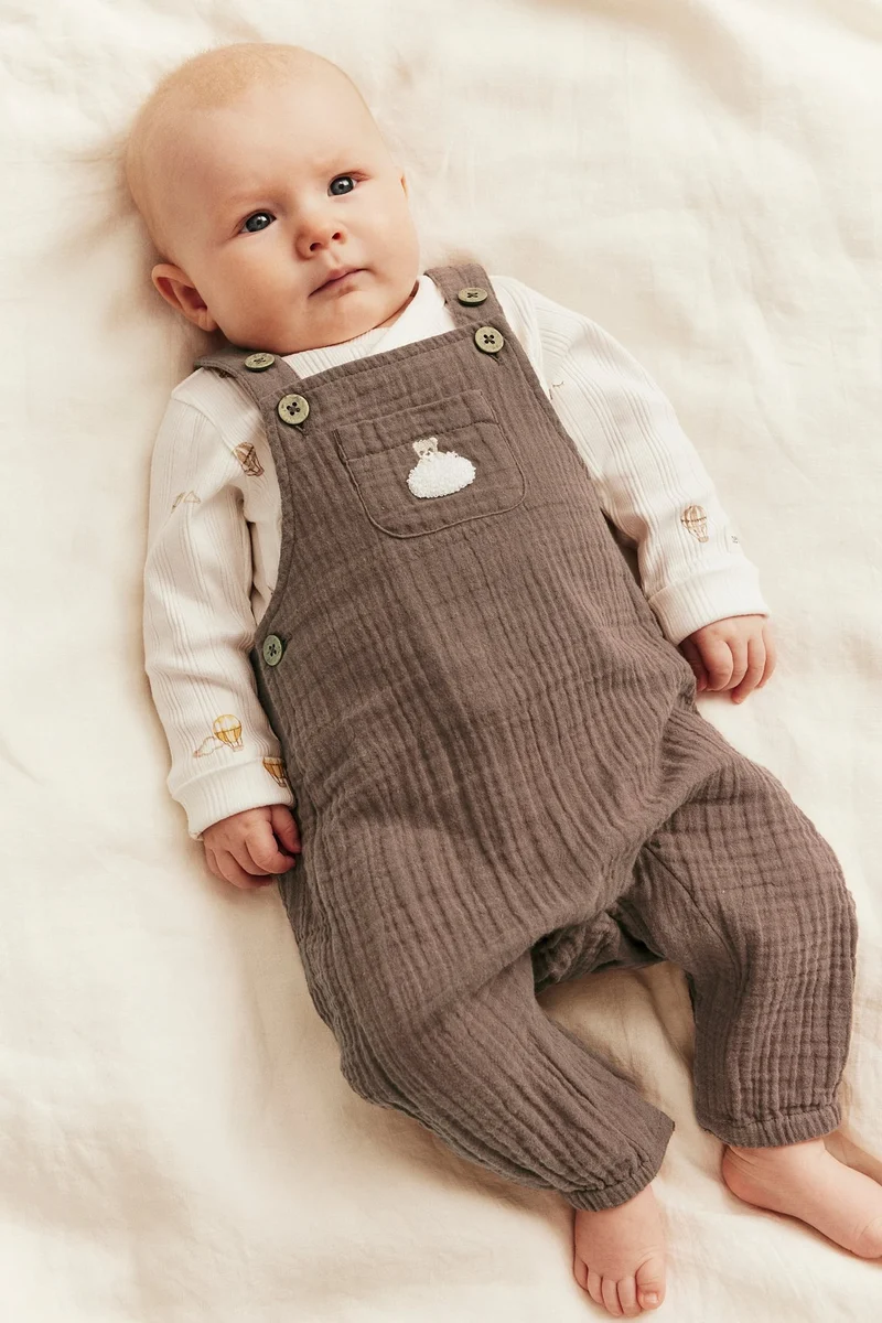 Baby muslin dungarees with teddy bear